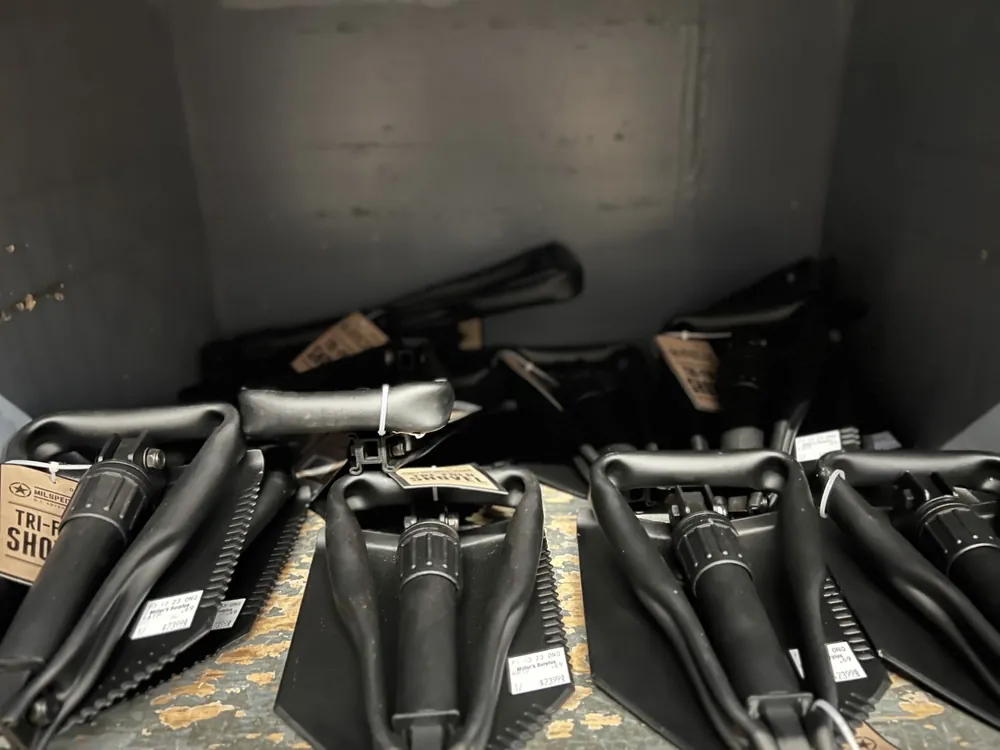 Military entrenching tools and folding shovels